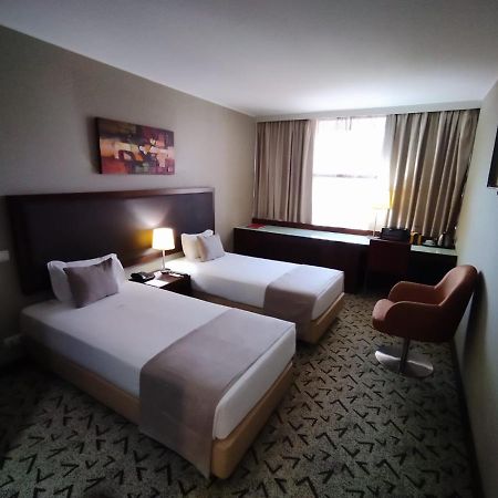 Skyna Hotel Luanda Bagian luar foto